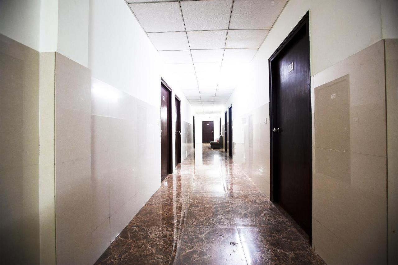 Oyo 44174 Hotel Mid Town Prime Harthala Dış mekan fotoğraf