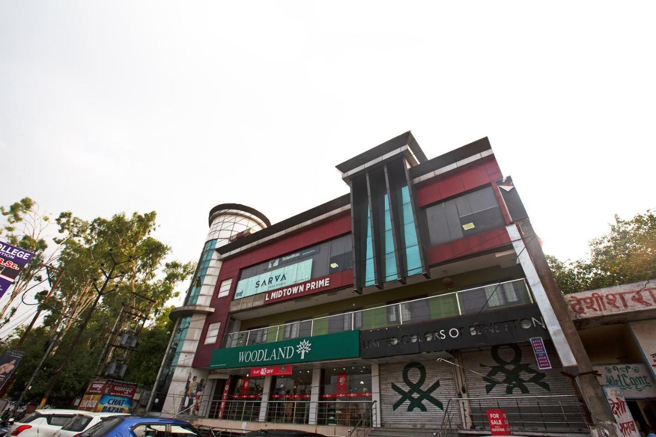 Oyo 44174 Hotel Mid Town Prime Harthala Dış mekan fotoğraf