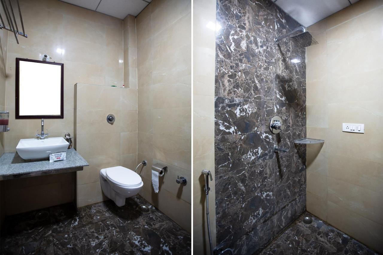 Oyo 44174 Hotel Mid Town Prime Harthala Dış mekan fotoğraf